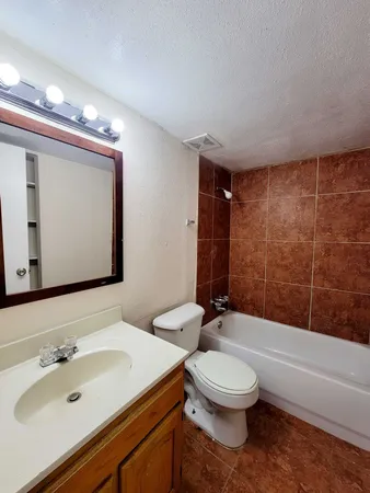 a view of a bathroom with shower