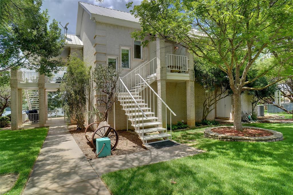 1003 Mesquite Ridge Graford, TX 76449 - Photo 11 of 40 a view of a house with a yard