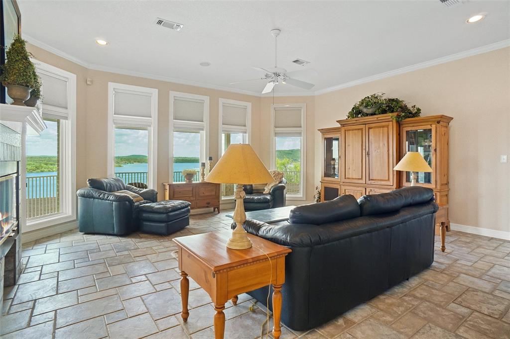 1003 Mesquite Ridge Graford, TX 76449 - Photo 17 of 40 a living room with furniture and a large window