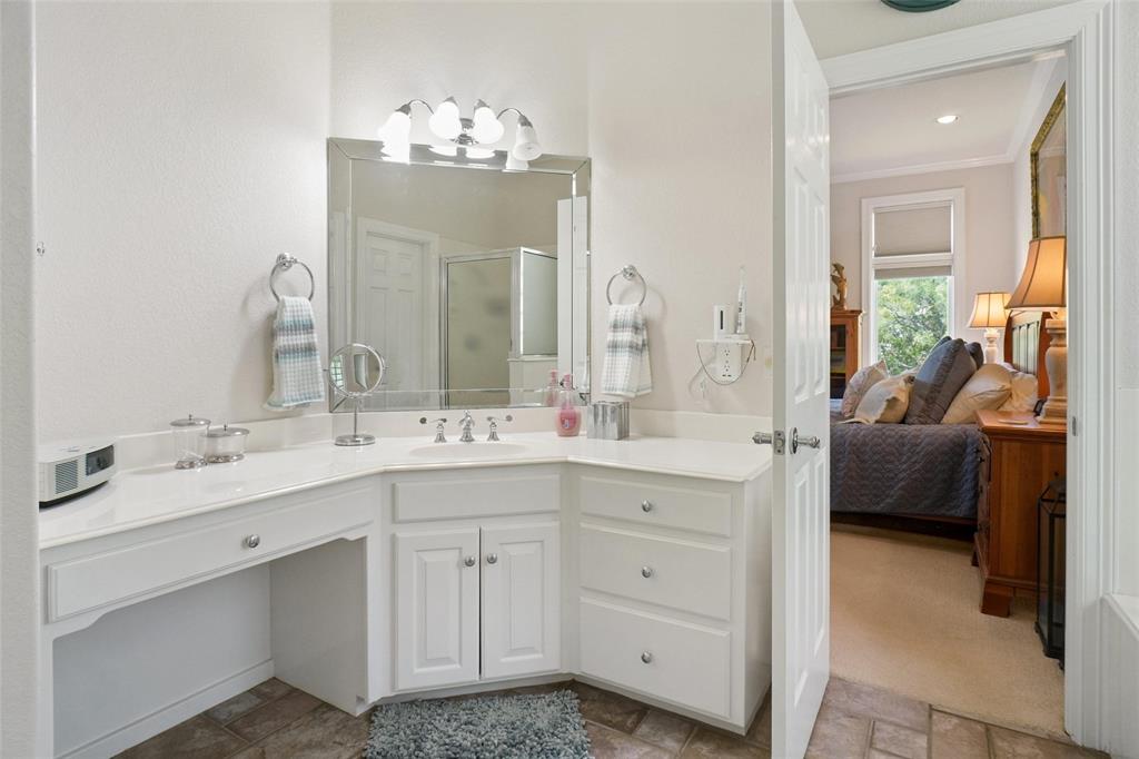 1003 Mesquite Ridge Graford, TX 76449 - Photo 26 of 40 a en suite bathroom with a double vanity sink double and mirror