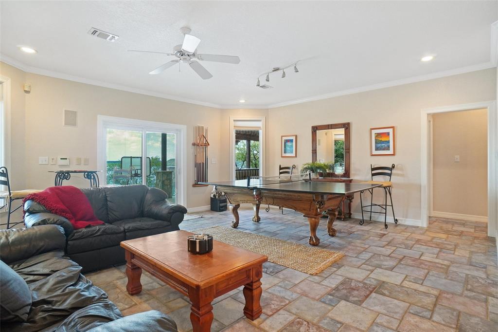 1003 Mesquite Ridge Graford, TX 76449 - Photo 29 of 40 a living room with furniture a window and a table