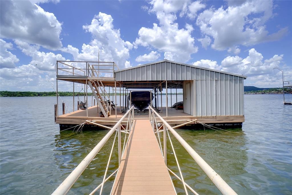1003 Mesquite Ridge Graford, TX 76449 - Photo 38 of 40 a view of a house with swimming pool and sitting area