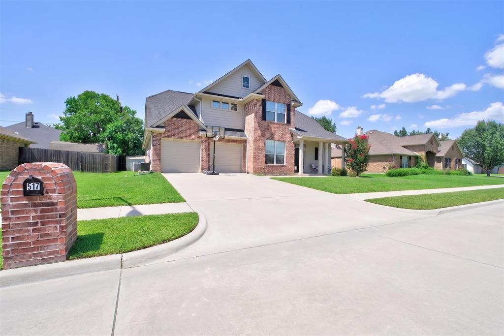 517 Austin Acre Road Sulphur Springs, TX 75482 - Photo 2 of 23 a front view of a house with garden