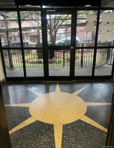 a view of balcony with furniture