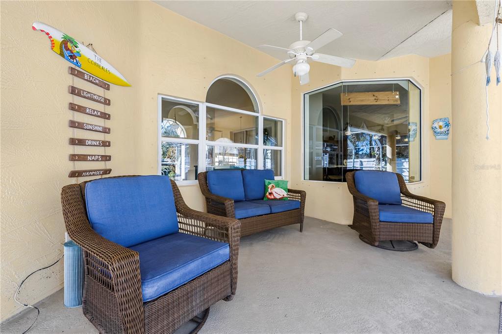 24 Regency Drive Palm Coast, FL 32164 - Photo 28 of 36 a living room with furniture and a large window