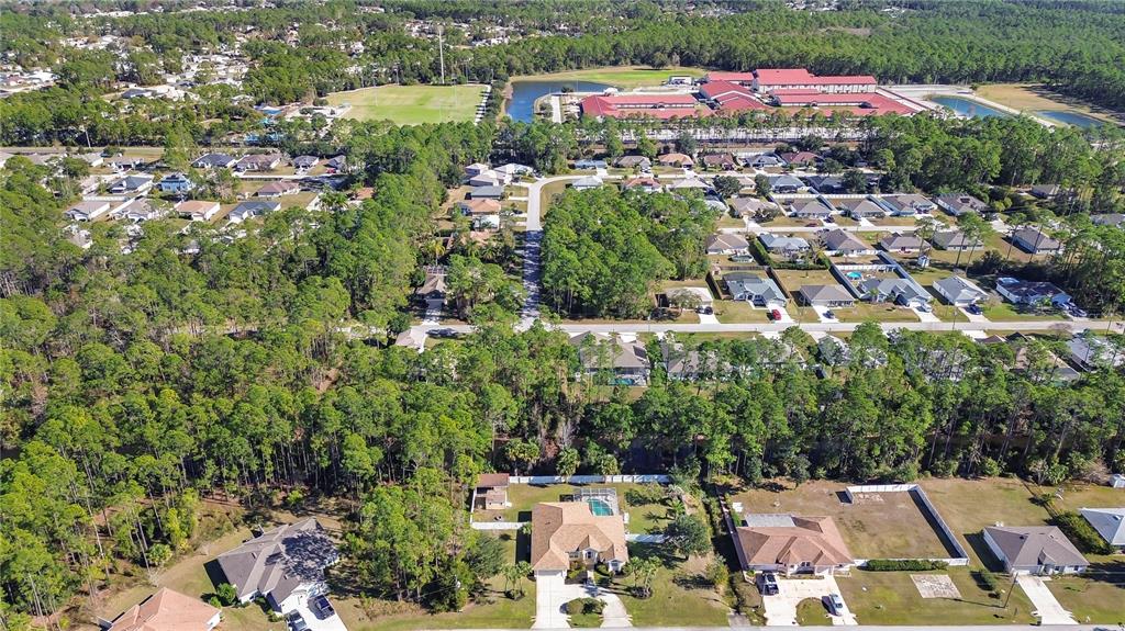 24 Regency Drive Palm Coast, FL 32164 - Photo 33 of 36 an aerial view of residential house with outdoor space