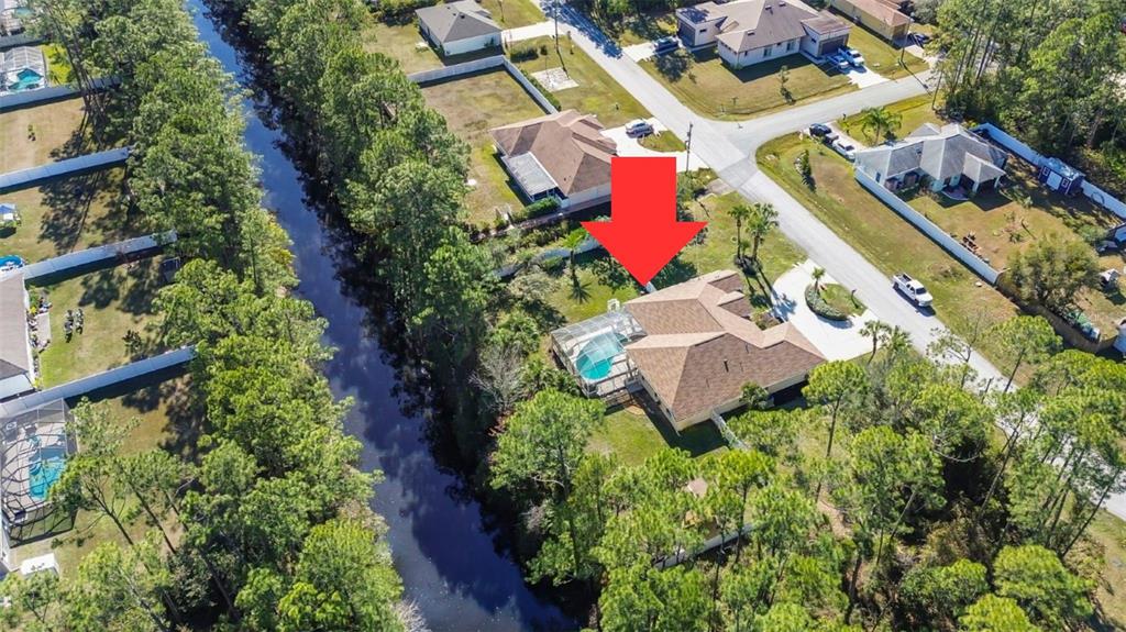 24 Regency Drive Palm Coast, FL 32164 - Photo 36 of 36 an aerial view of residential house with outdoor space and swimming pool