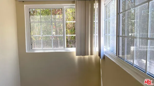 a view of a large window with an outdoor space