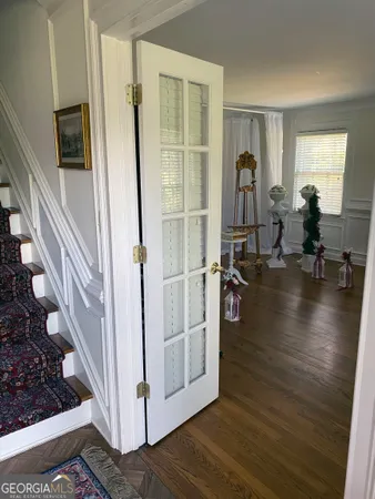 a view of a livingroom with furniture and front door