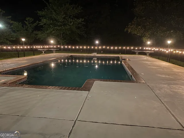 a swimming pool with a yard
