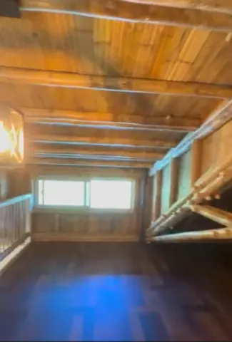 a view of a field with an ocean