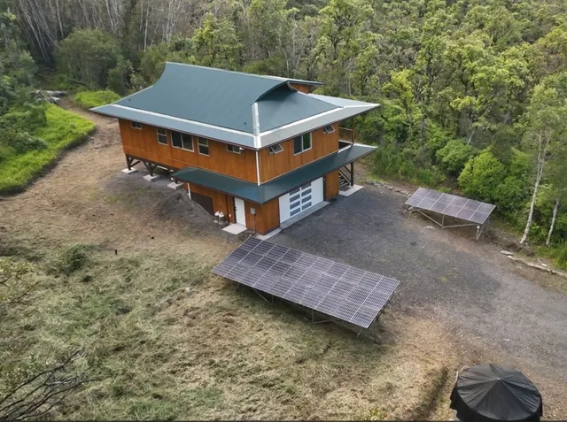 a view of a patio with a table and a chairs