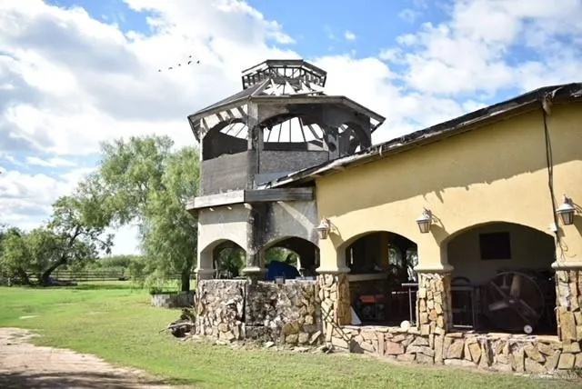 a view of a yard with front of house