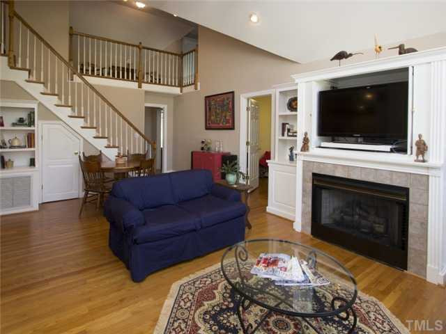 910 Lake Boone Trail Raleigh, NC 27607 - Photo 18 of 25 Gas logs. lovely hardwoods, built in bookshelves and recessed lighting. Den/Family/Great Room