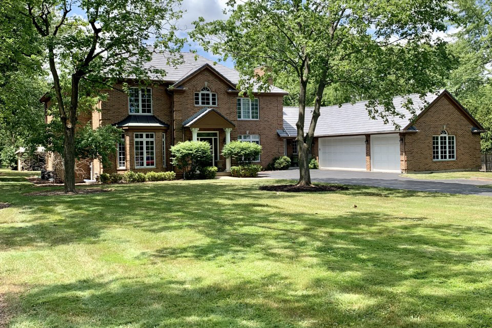 1830 Telegraph Road Lake Forest, IL 60045 - Photo 1 of 31 a front view of a house with a yard