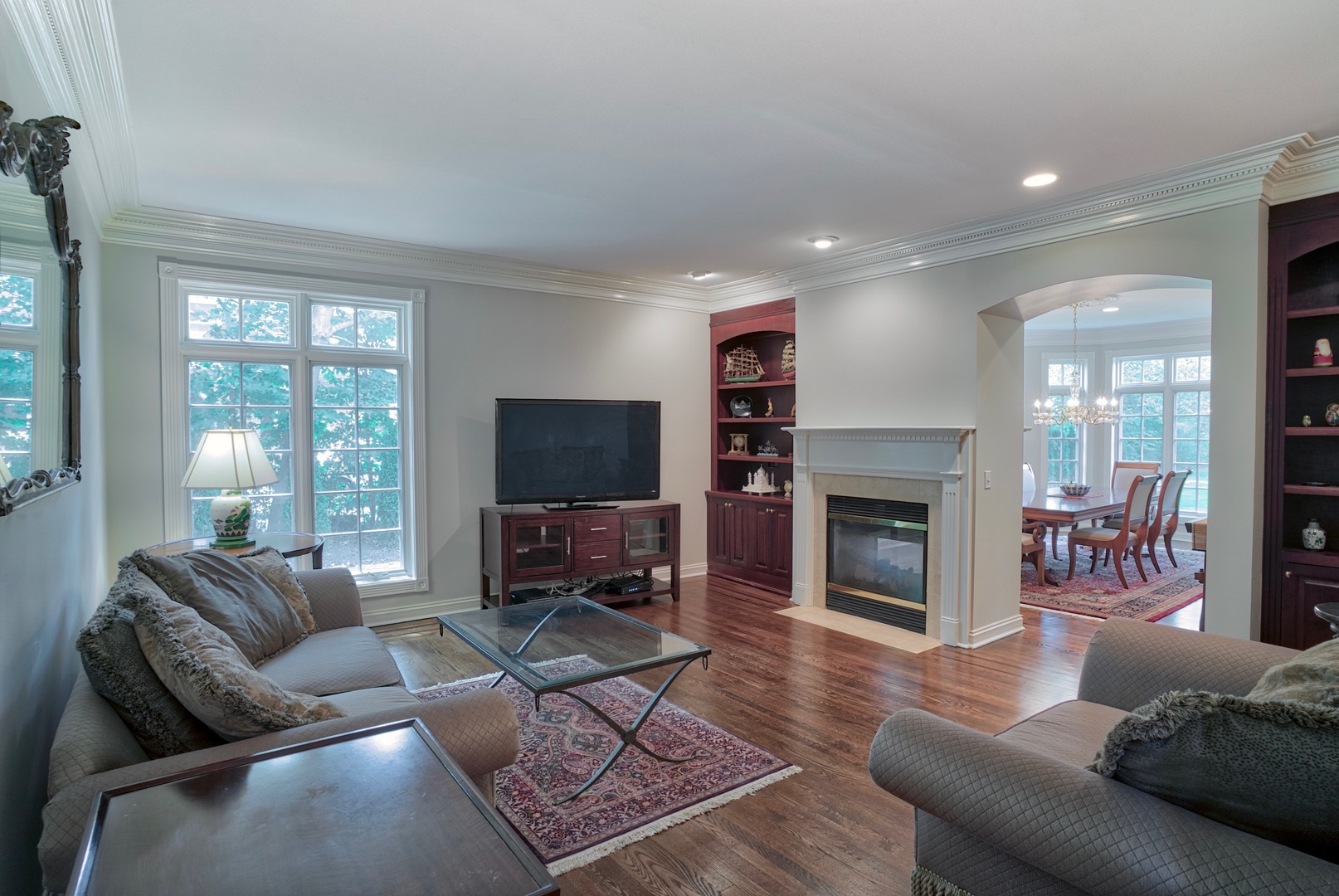 1830 Telegraph Road Lake Forest, IL 60045 - Photo 13 of 31 a living room with furniture a fireplace and a flat screen tv