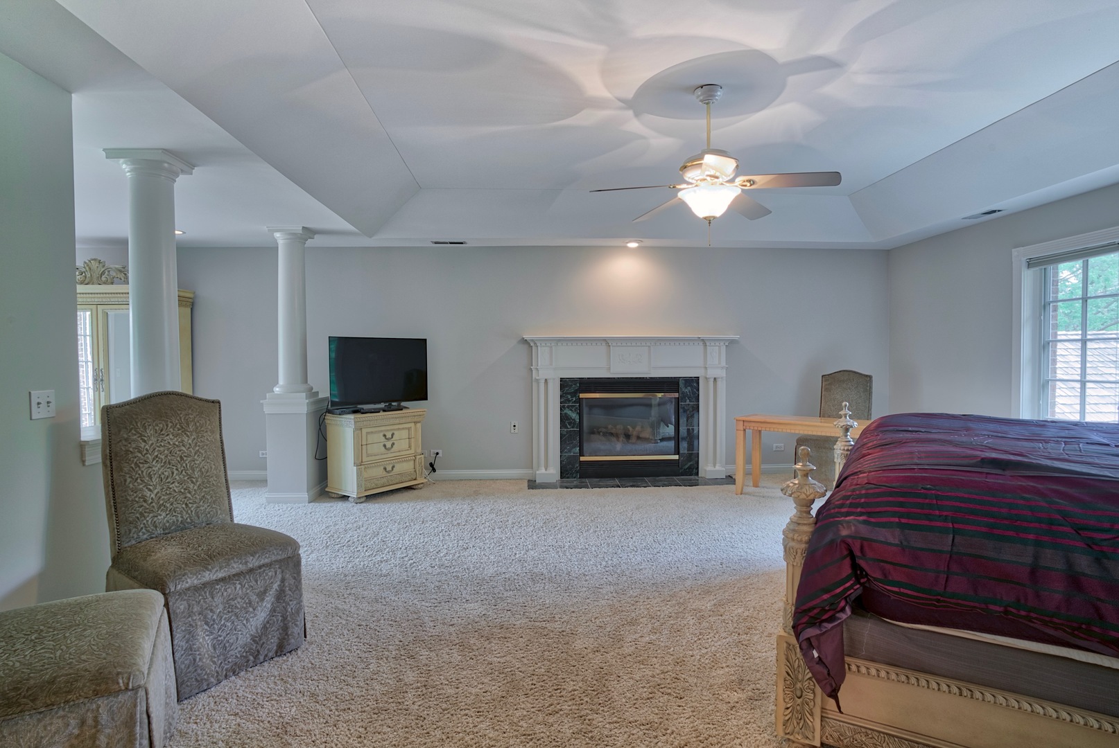 1830 Telegraph Road Lake Forest, IL 60045 - Photo 15 of 31 a living room with furniture a fireplace and a flat screen tv