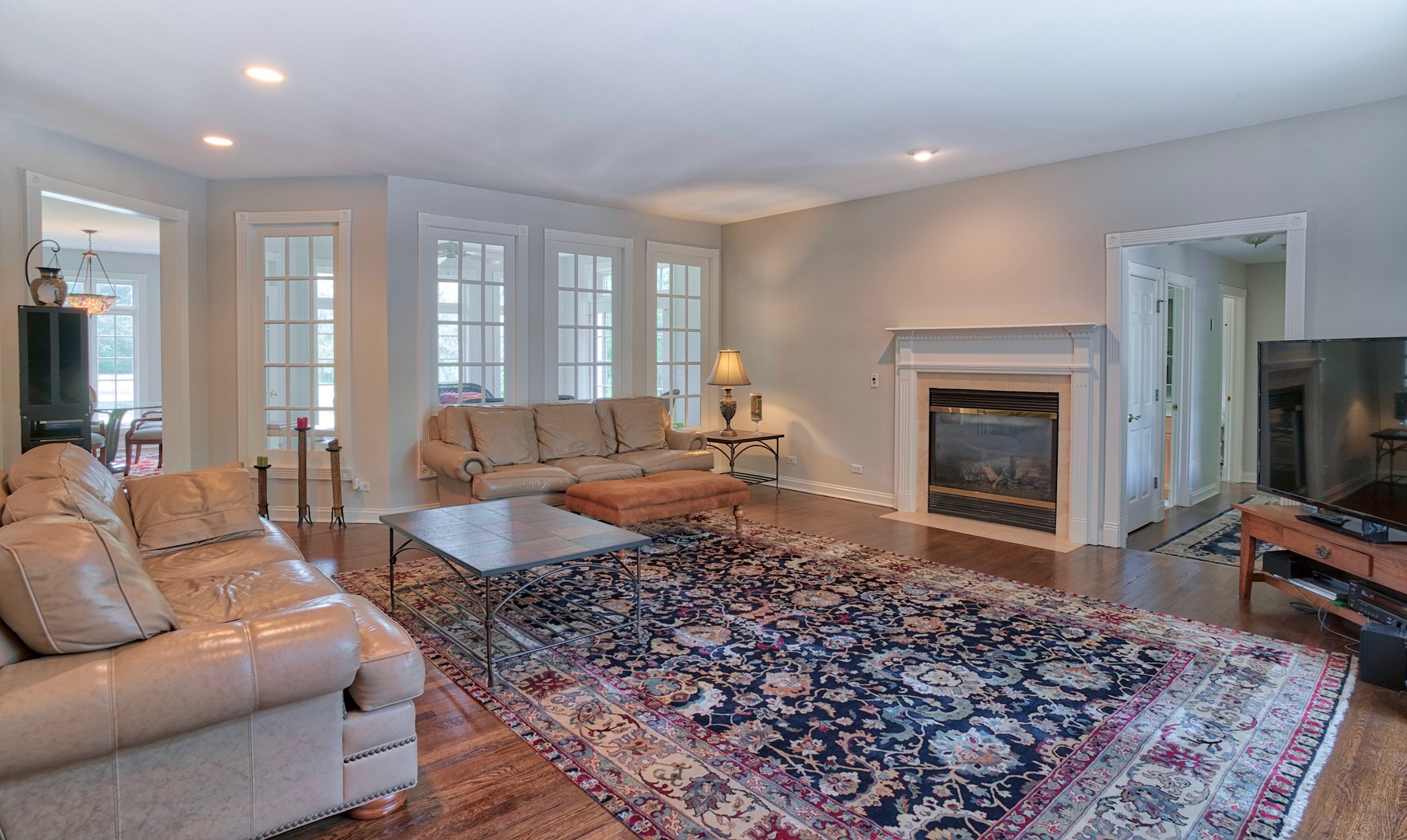 1830 Telegraph Road Lake Forest, IL 60045 - Photo 6 of 31 a living room with a couch and a fireplace