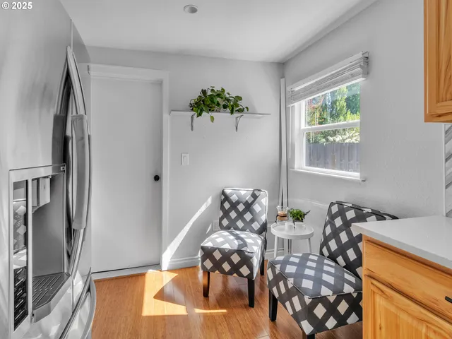 a view of a dining room with furniture window and outside view
