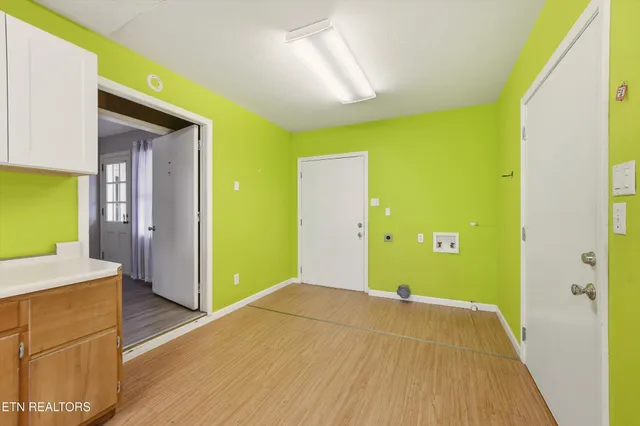 a bedroom with a bed and a table