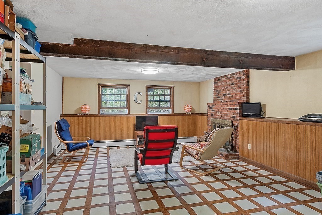 77 Hunt Road Chelmsford, MA 01824 - Photo 21 of 36 a living room with furniture and a view of kitchen