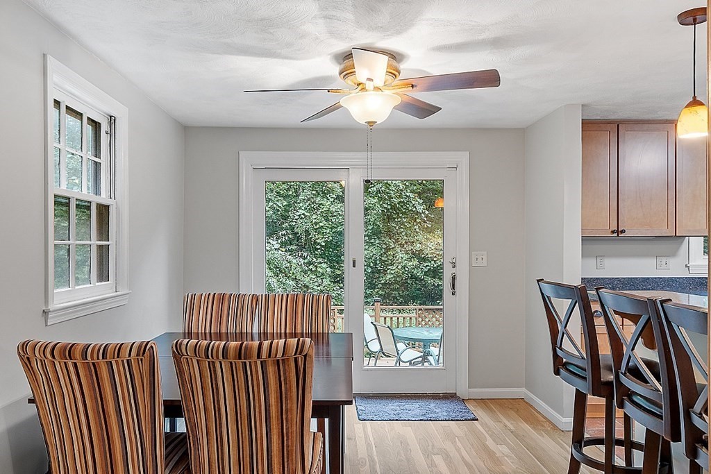 77 Hunt Road Chelmsford, MA 01824 - Photo 8 of 36 a view of a livingroom with furniture and staircase
