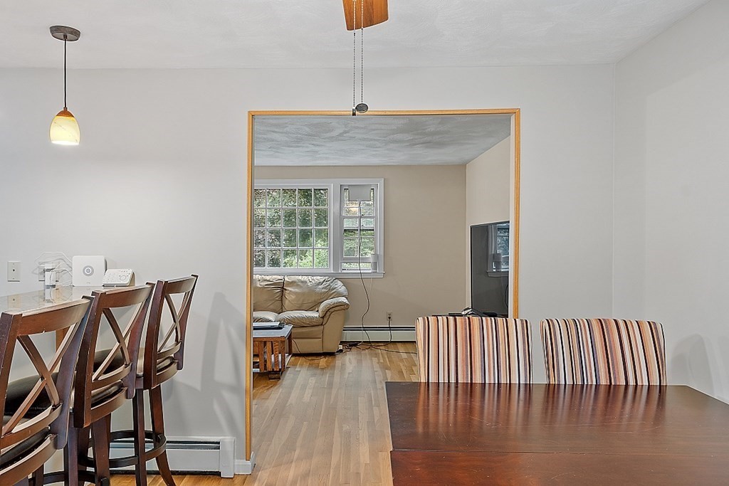 77 Hunt Road Chelmsford, MA 01824 - Photo 9 of 36 a bedroom with furniture and wooden floor