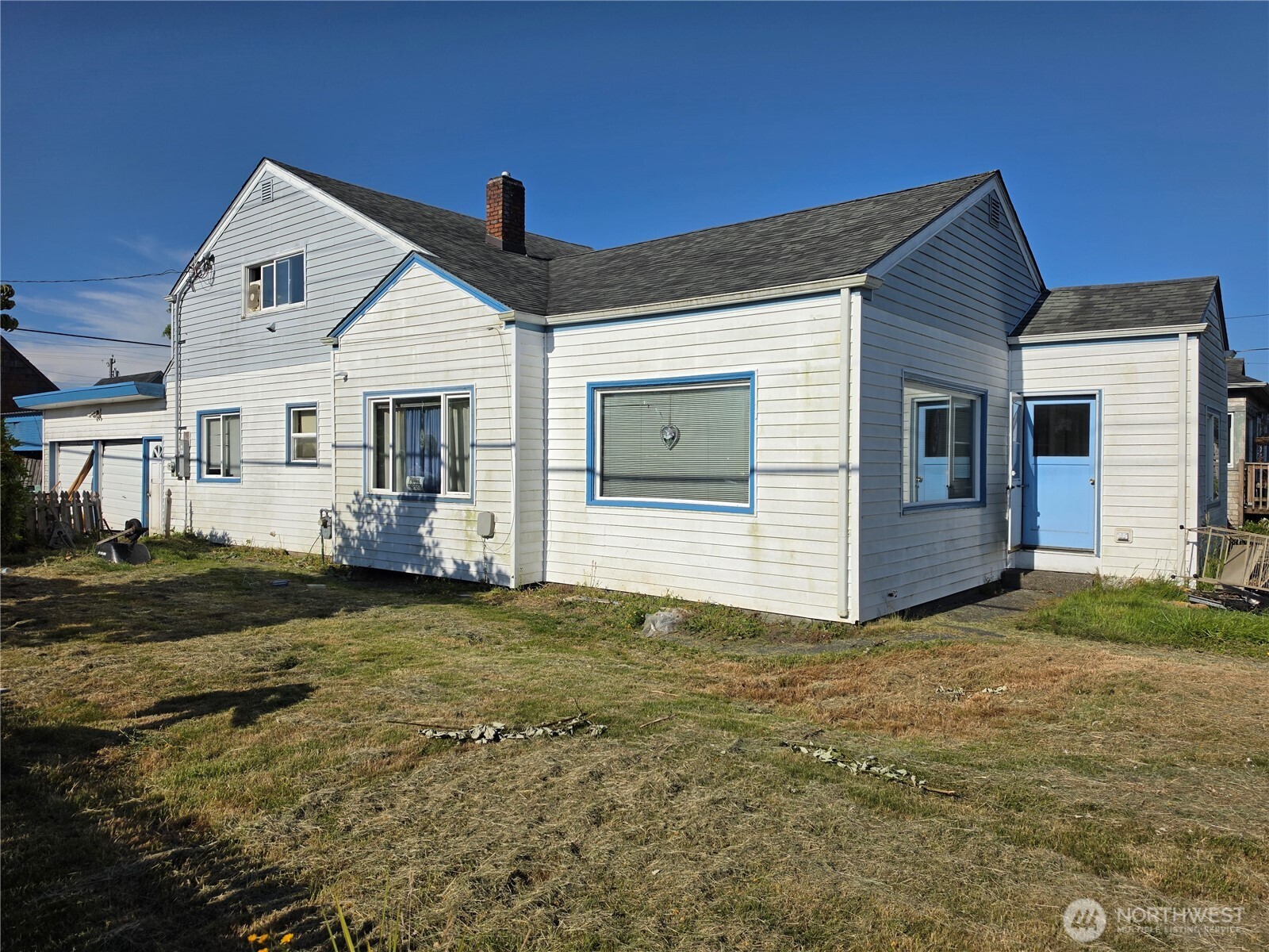 1518 West 1st Street Aberdeen, WA 98520 - Photo 1 of 17 a view of a house with a yard