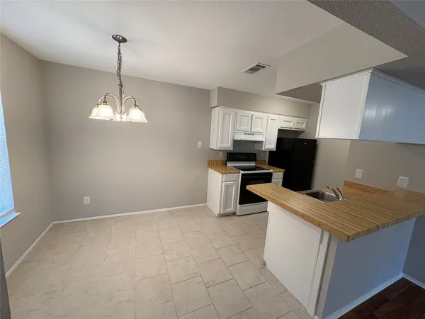 $1,150 | 312 South Poplar Street, Unit 4, Tomball, TX 77375