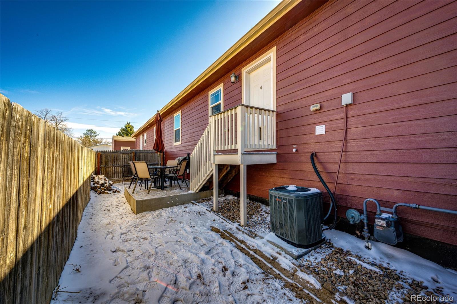 570 4th Street Bennett, CO 80102 - Photo 29 of 36 a view of a chairs with wooden fence