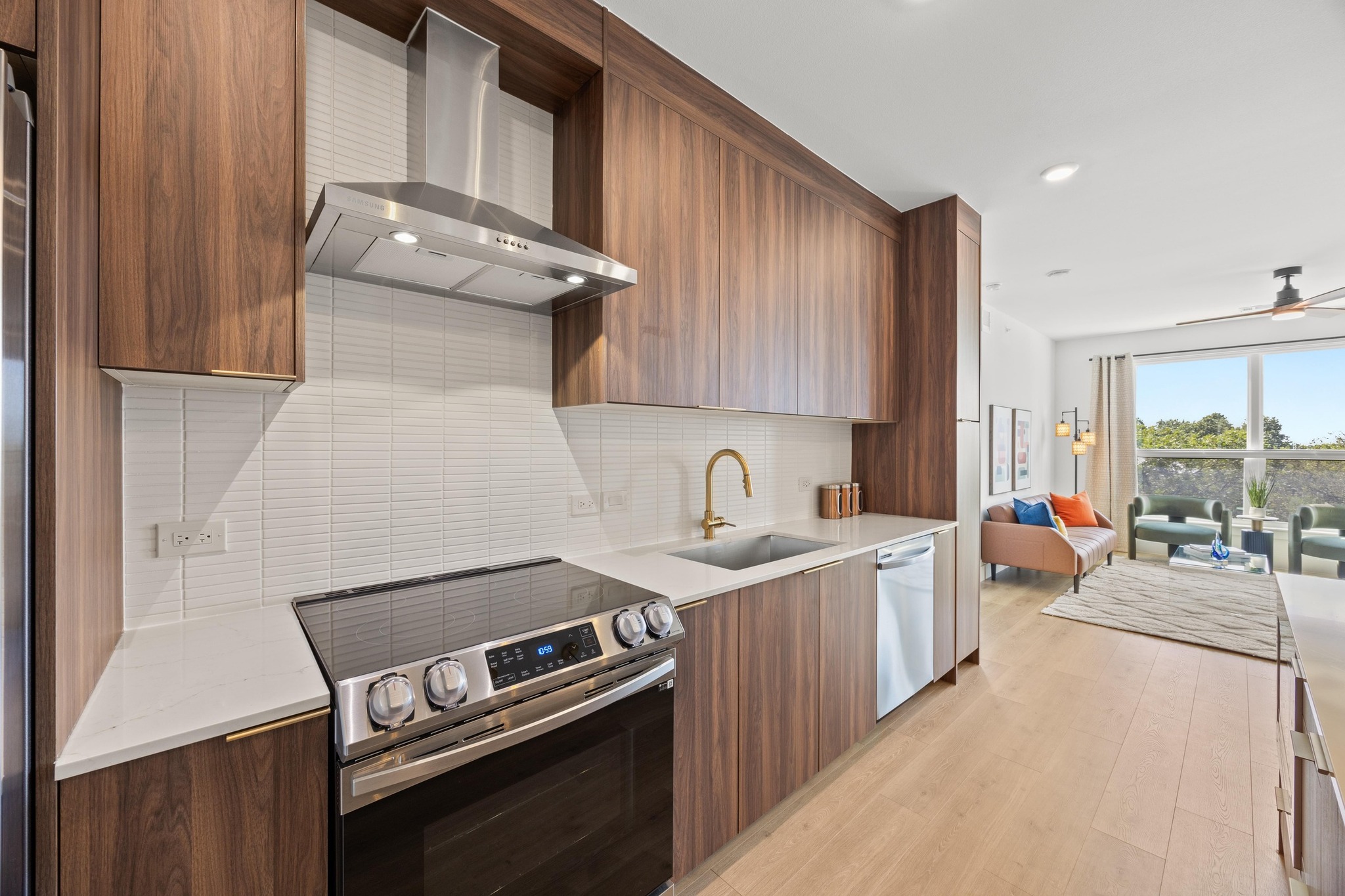 1701 Simond Avenue, Unit 223 Austin, TX 78723 - Photo 13 of 40 a kitchen with a stove and a sink