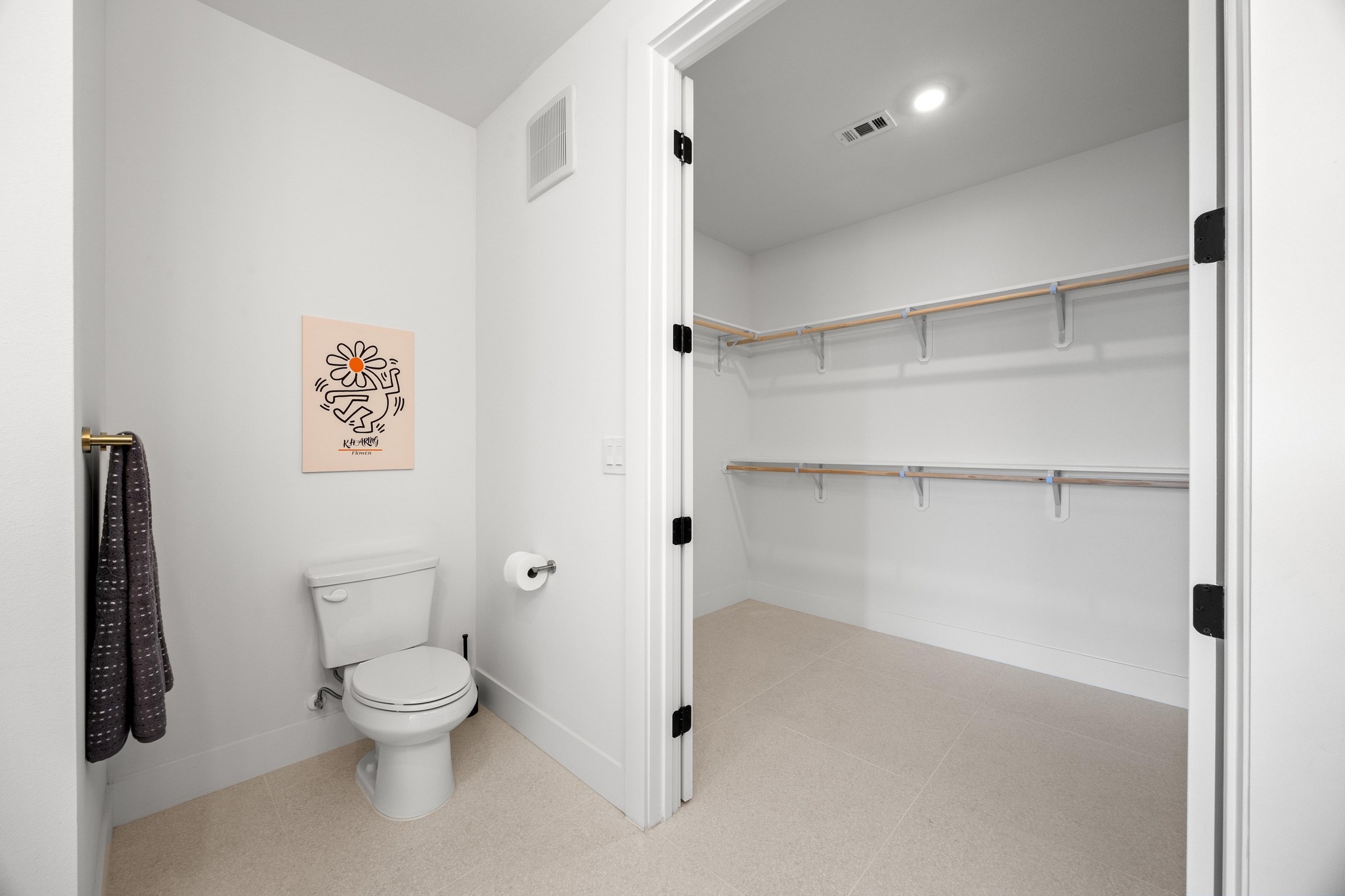 1701 Simond Avenue, Unit 223 Austin, TX 78723 - Photo 20 of 40 a white toilet sitting next to a bathroom sink