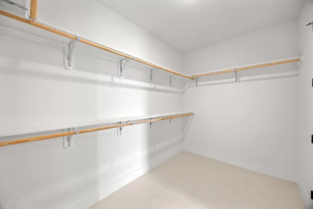 a view of a room with racks on the wall