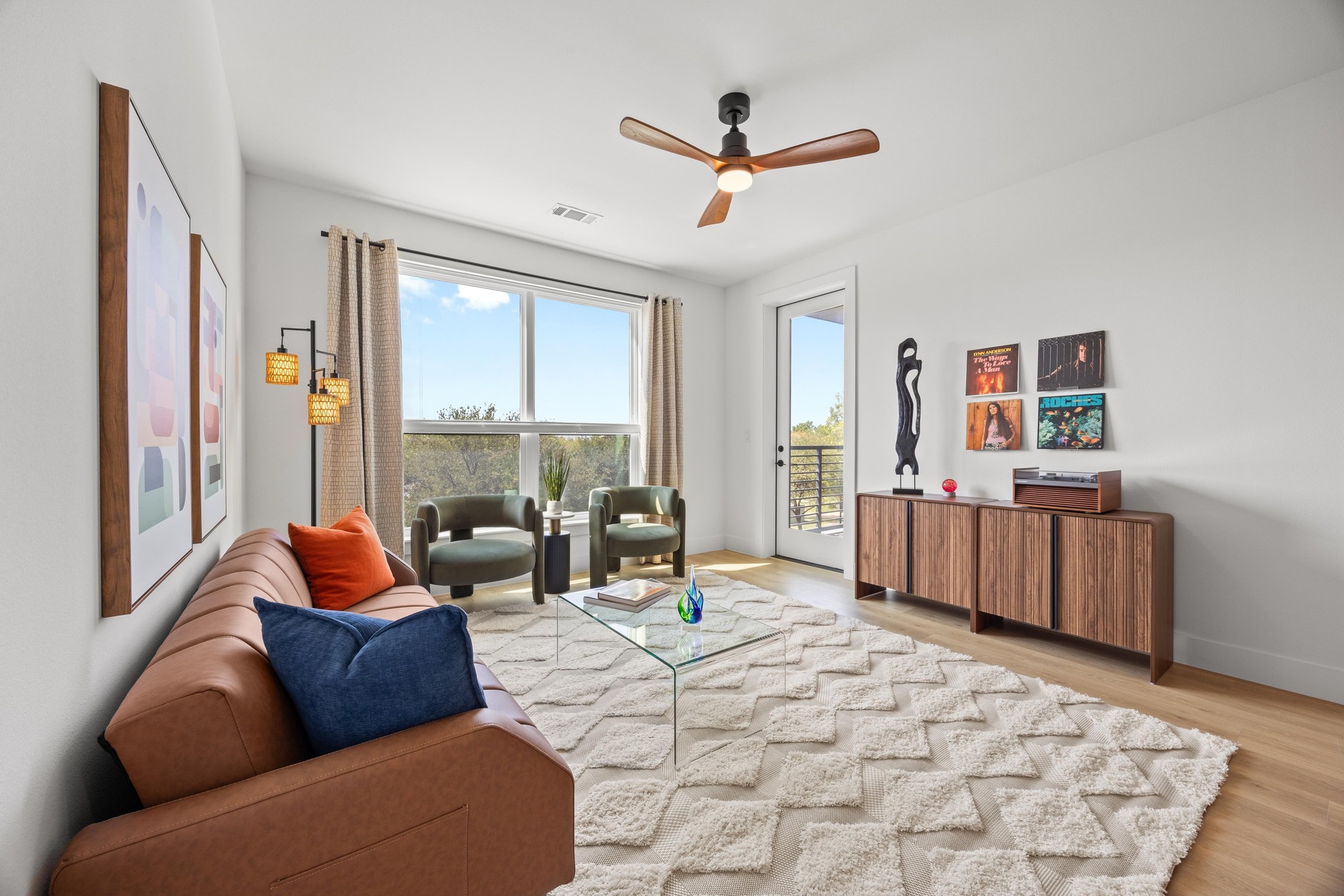 1701 Simond Avenue, Unit 223 Austin, TX 78723 - Photo 3 of 40 a living room with furniture and a large window