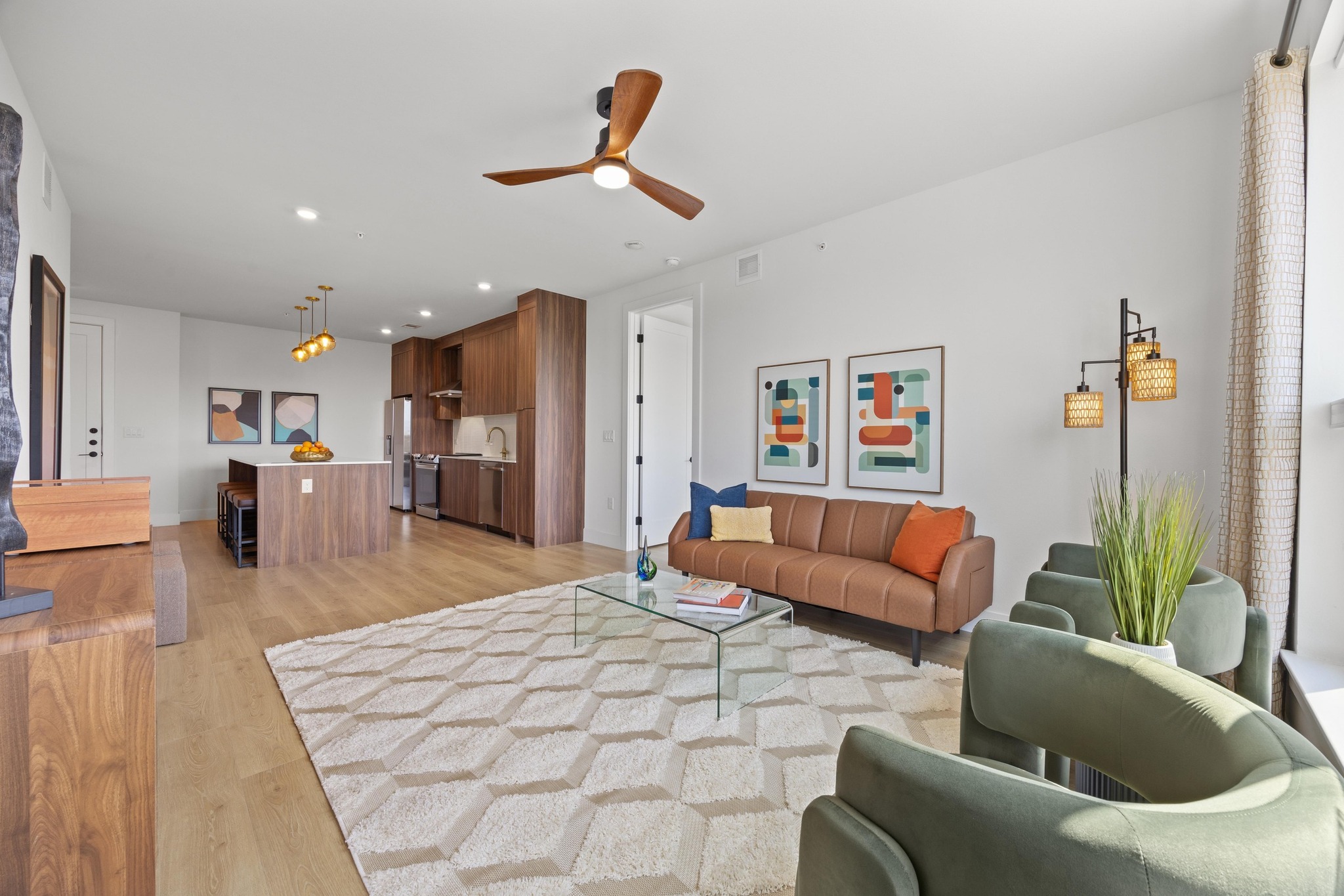 1701 Simond Avenue, Unit 223 Austin, TX 78723 - Photo 8 of 40 a living room with furniture and kitchen view