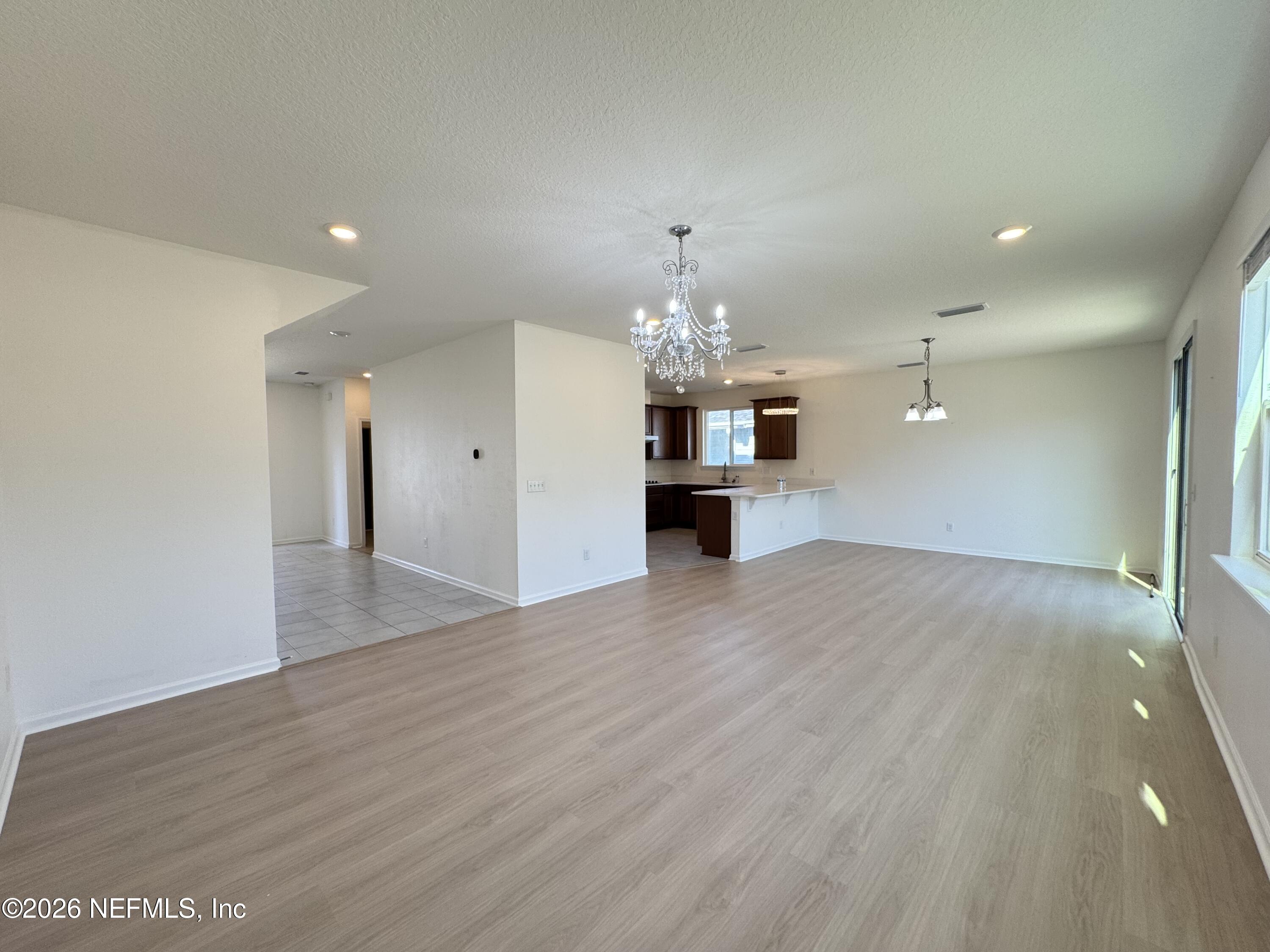 310 Rambling Brk Trail St. Johns, FL 32259 - Photo 27 of 28 a view of a livingroom with a chandelier