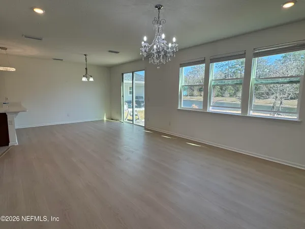 a view of an empty room and window