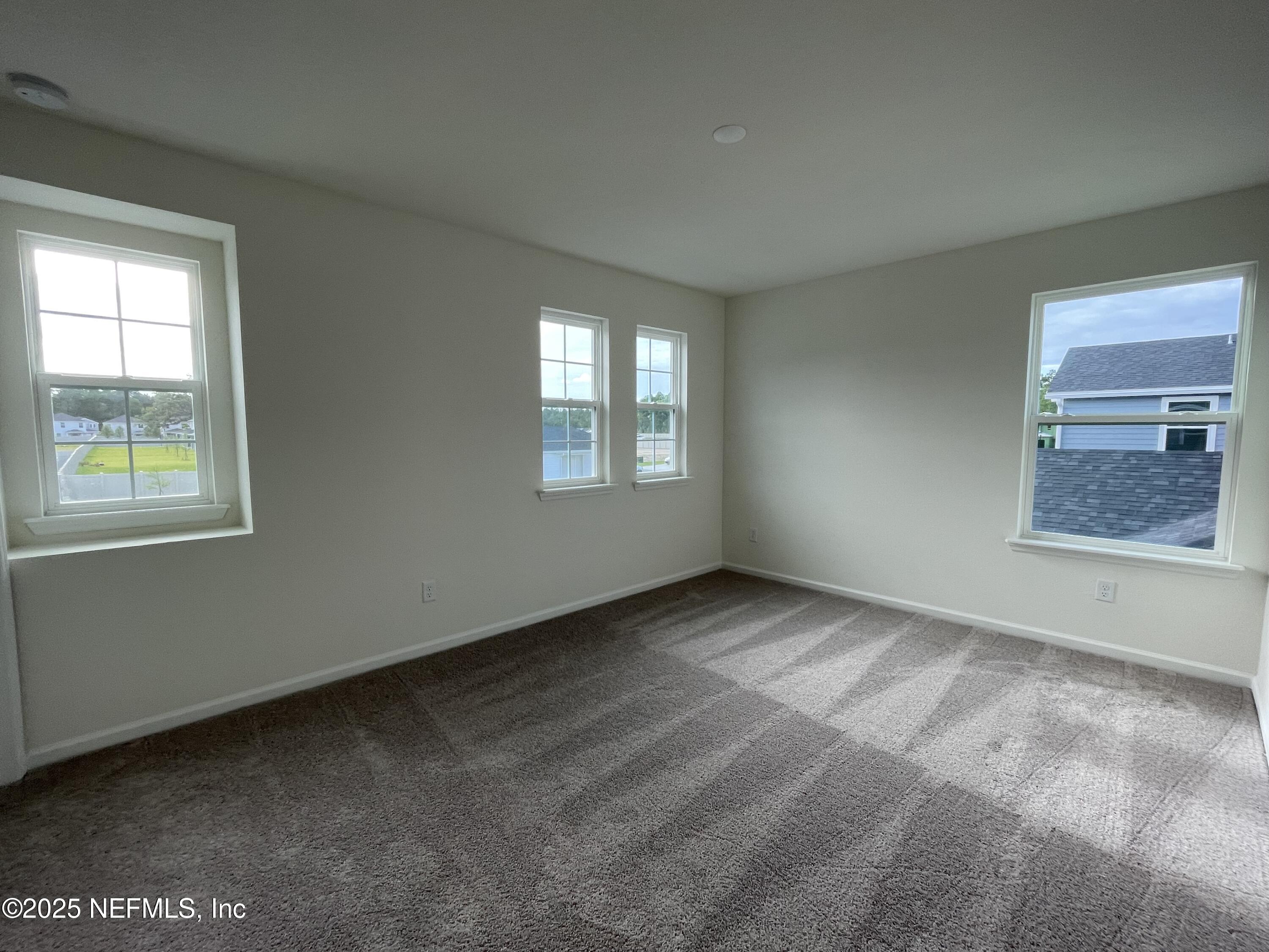 310 Rambling Brk Trail St. Johns, FL 32259 - Photo 8 of 28 a view of an empty room and window