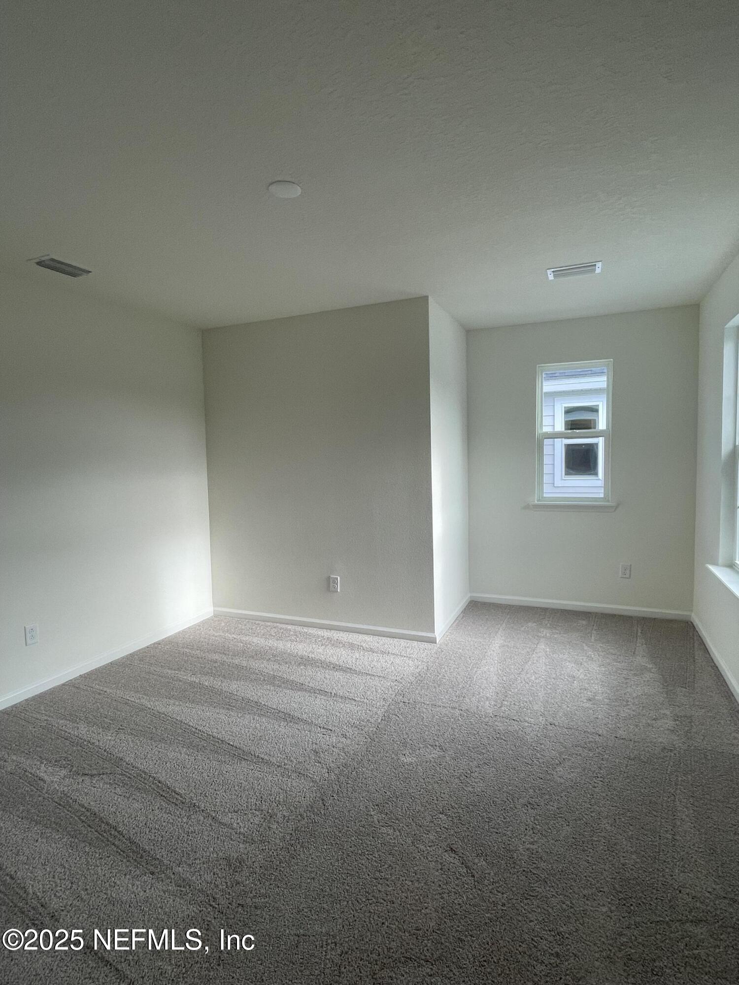 310 Rambling Brk Trail St. Johns, FL 32259 - Photo 9 of 28 a view of empty room with window
