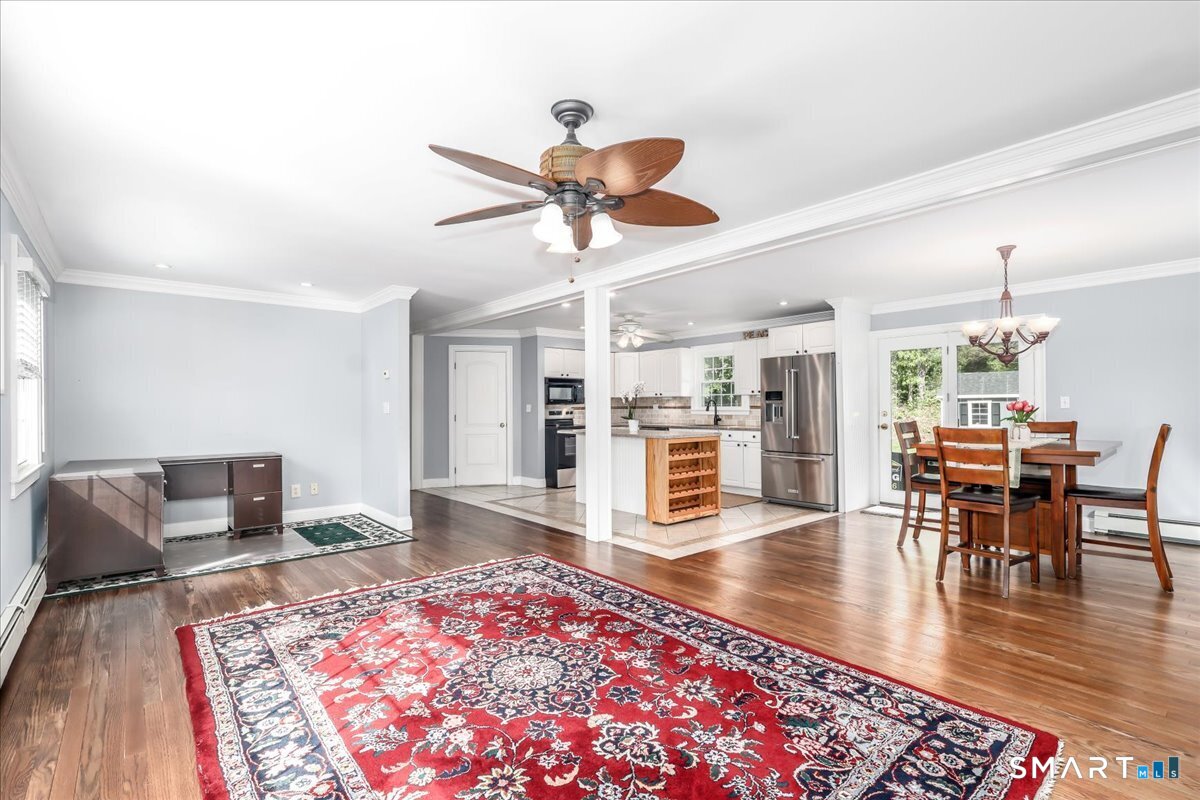 19 Botsford Hill Road Newtown, CT 06470 - Photo 15 of 40 a living room with furniture and a rug