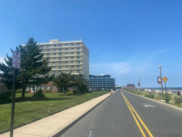 a view of a brick building with many windows