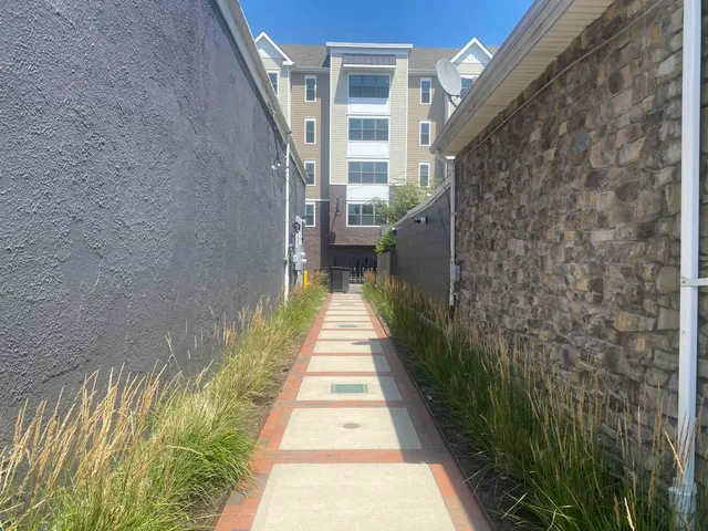 a view of a building with a swimming pool