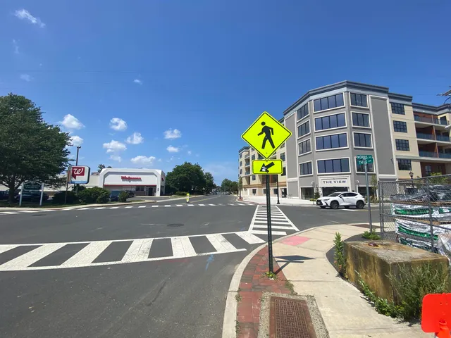 a view of a building with a street