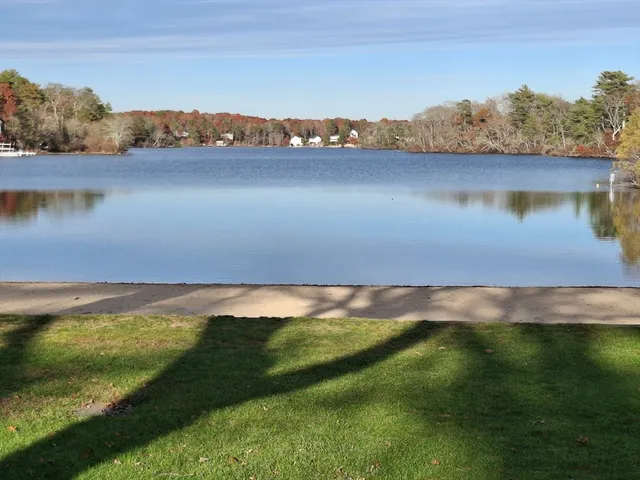 a view of an ocean and a mountain