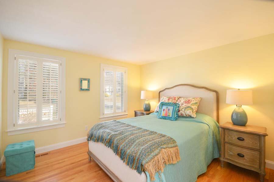 21 Dovetail Lane Cotuit, MA 02635 - Photo 10 of 30 a bedroom with a bed and window