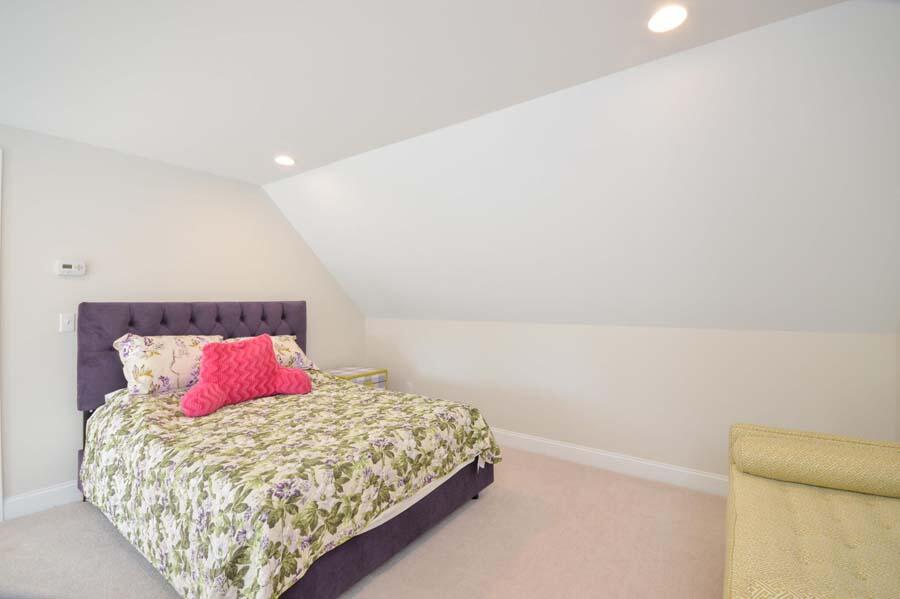 21 Dovetail Lane Cotuit, MA 02635 - Photo 15 of 30 a bedroom with a bed and pillows