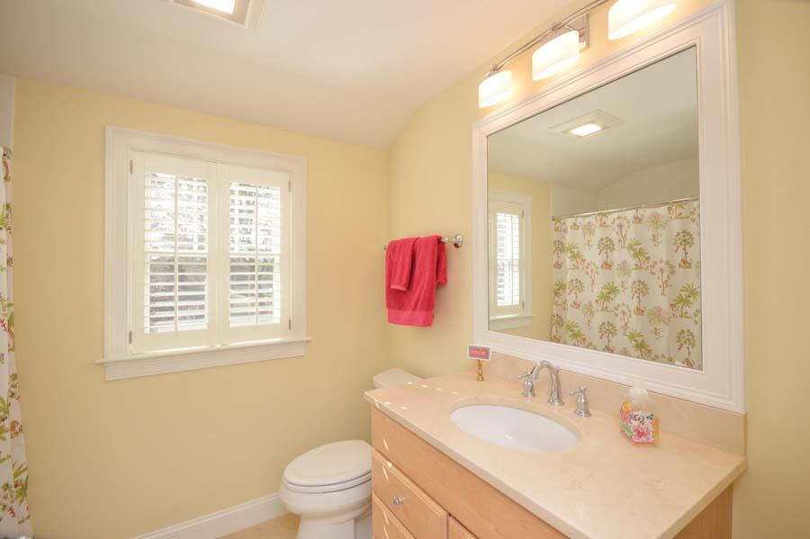 21 Dovetail Lane Cotuit, MA 02635 - Photo 19 of 30 a bathroom with a sink vanity mirror and a toilet