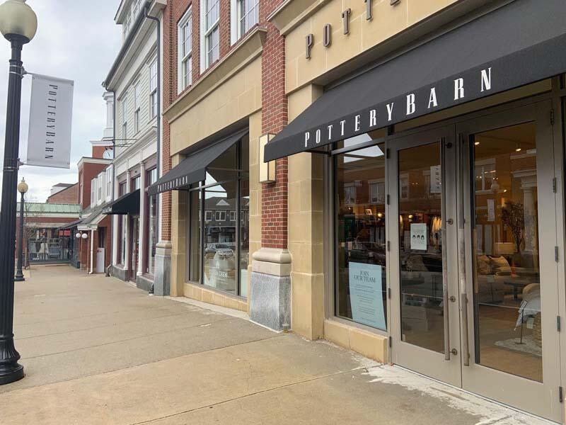 21 Dovetail Lane Cotuit, MA 02635 - Photo 24 of 30 a view of shops in a street