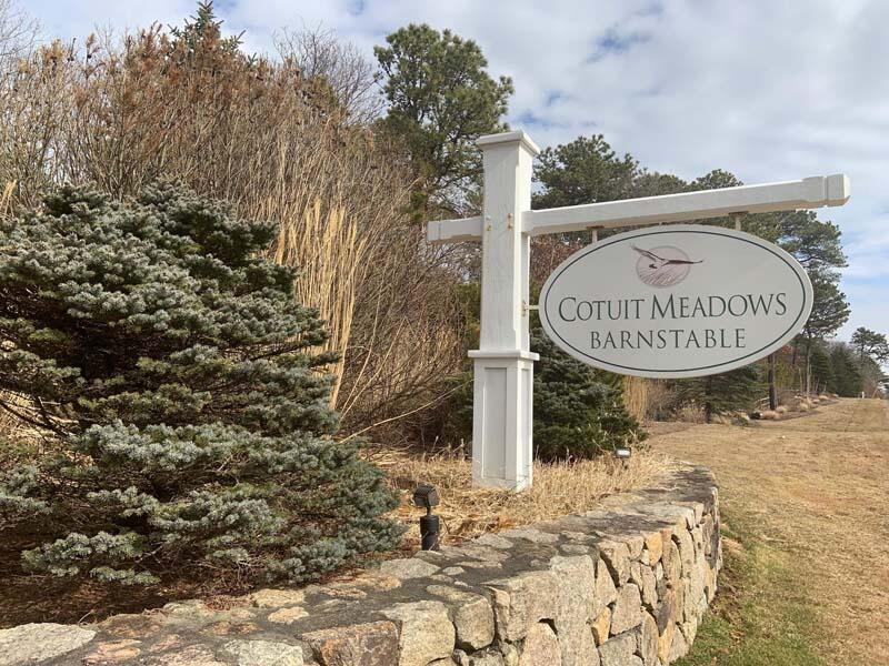 21 Dovetail Lane Cotuit, MA 02635 - Photo 26 of 30 a view of a wooden door of a house