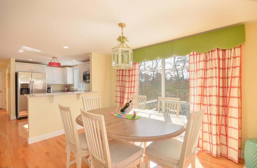 21 Dovetail Lane Cotuit, MA 02635 - Photo 9 of 30 a dining table chairs and a chandelier
